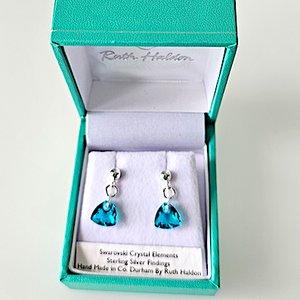 Tiny teal soft triangle post earrings Tiny teal soft triangle post earrings