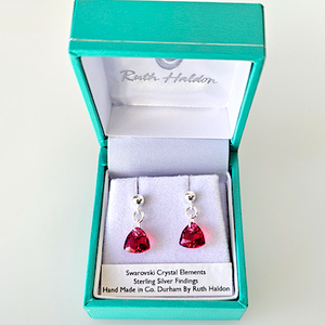 Tiny scarlet soft triangle post earrings Tiny scarlet soft triangle post earrings