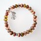 Warm peach/tan glass stretch bracelet