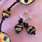 Black/gold Murano swirl post earrings