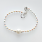 Cream European crystal bracelet with pearl.