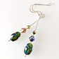 Black multi crystal scarab hook earrings