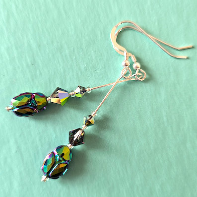 Black multi crystal scarab hook earrings