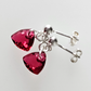 Tiny scarlet soft triangle post earrings