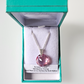 Pink, domed disc, crystal pendant