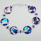 Clear disc multi spot bracelet