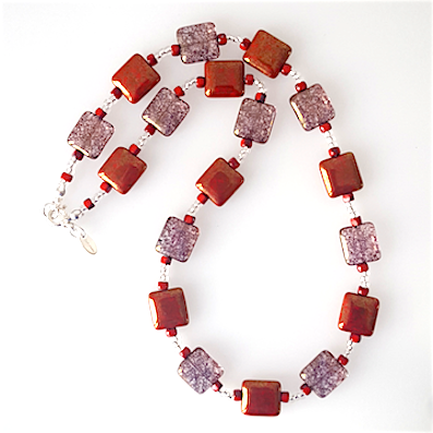 Red/clear mottled pillow necklace