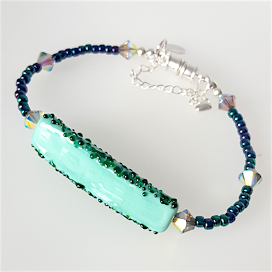 Lamp-work triangle tube aqua bracelet