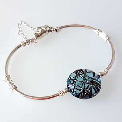 Blue disc lamp-work bead and silver bracelet