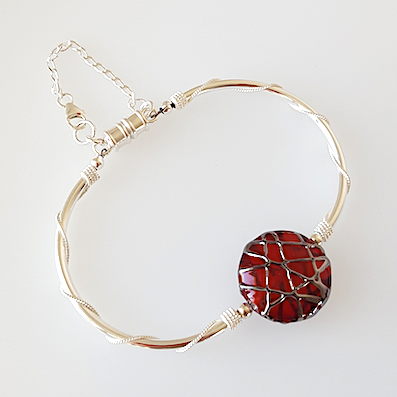 Red disc lamp-work bead and silver bracelet