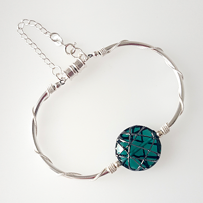 Green disc lamp-work bead and silver bracelet