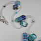 Aqua lamp-work beads & crystal, long necklace