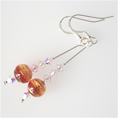 Orange/golden swirls Murano hook earrings