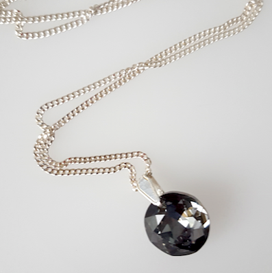 Black diamond crystal domed disc pendant